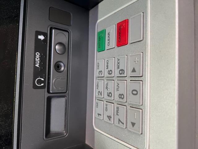 ATM controls with raised features